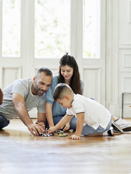 Family on playing on engineered hardwood floors